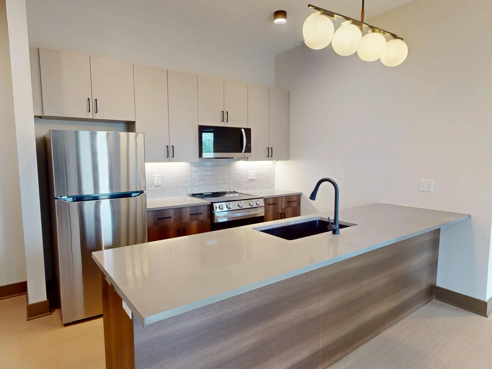 Kitchen • 2 Bedroom + Den Unit