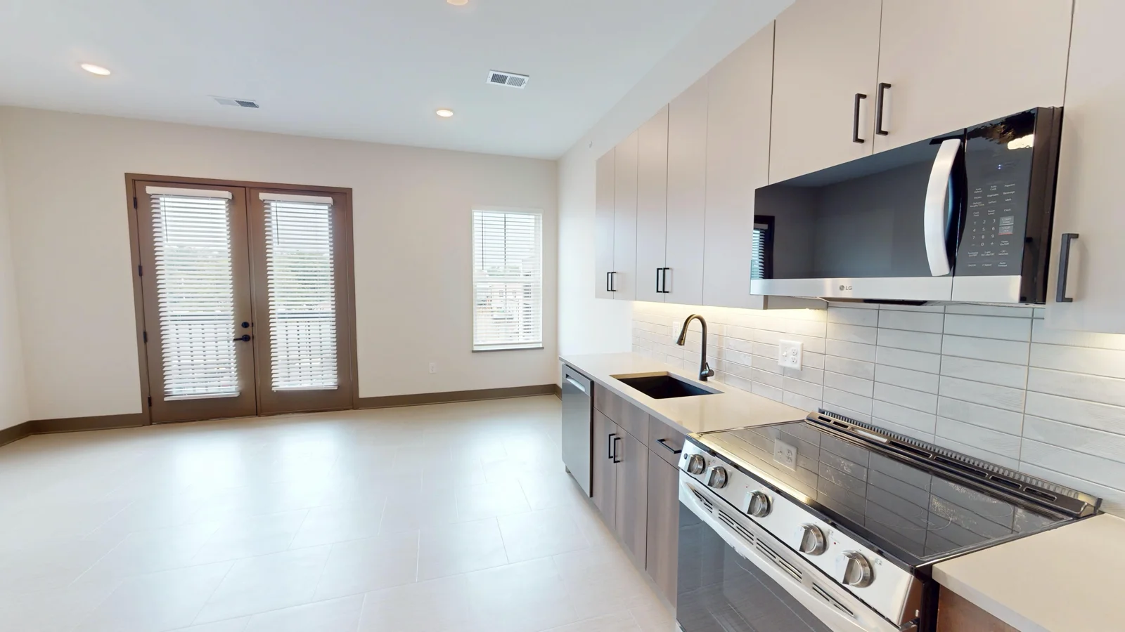Living Room + Kitchen • Studio Unit