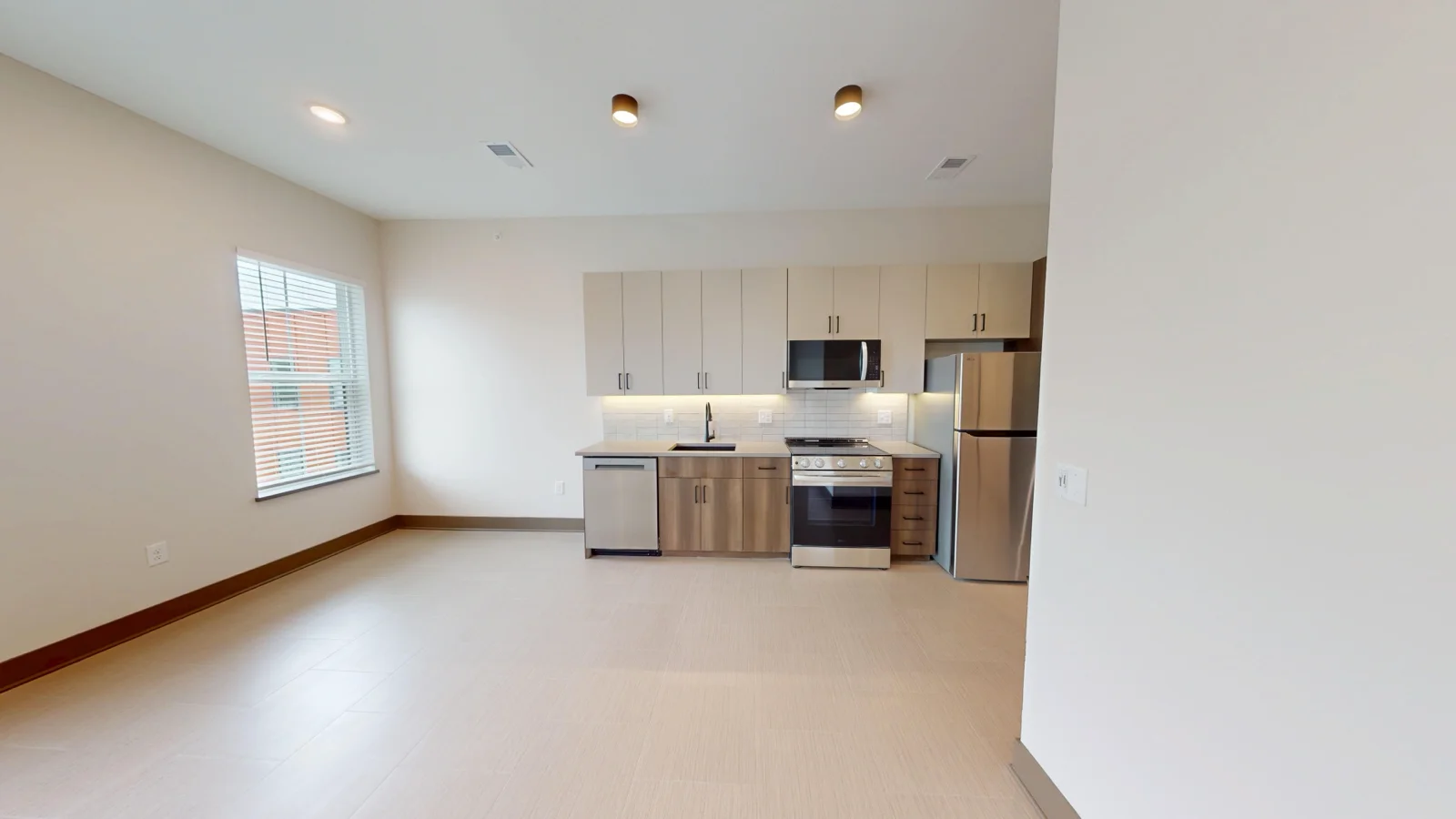 Living Room + Kitchen • Alternate View • Studio Unit